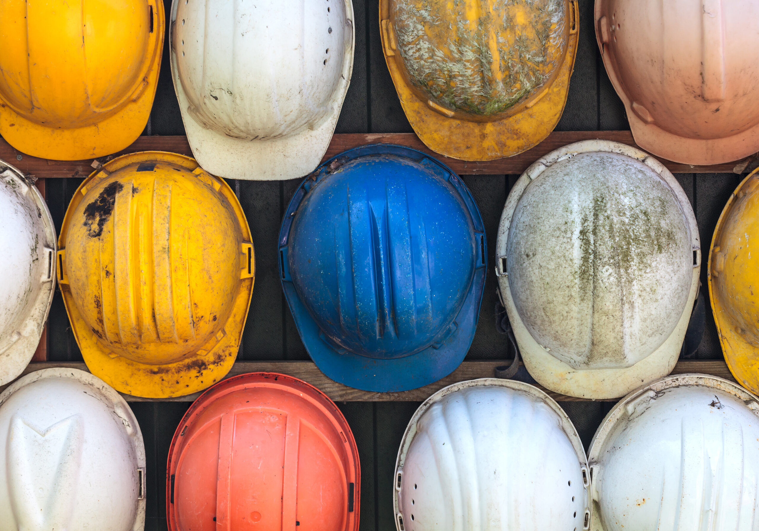 Old,And,Worn,Colorful,Construction,Helmets Old,And,Worn,Colorful,Construction,Helmets